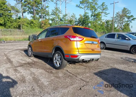 2016 Ford Escape Titanium z USA, uszkodzony, nr VIN 1FMCU0J97GUB31326